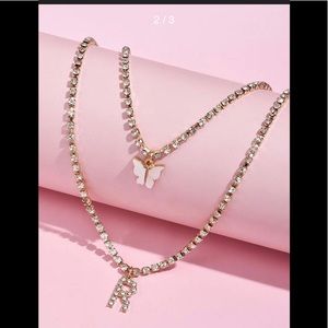Letter R butterfly diamond necklace